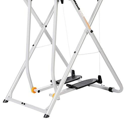 Foldable exercise stepper machine with white frame.