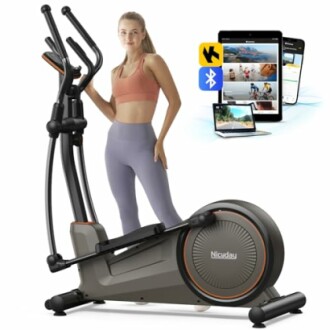 Woman using an elliptical machine with fitness app integration.