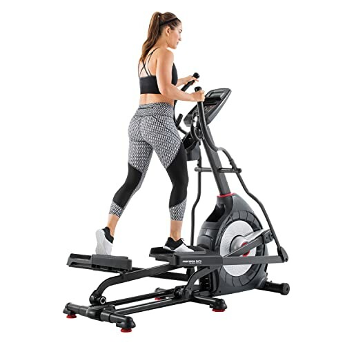 Woman exercising on an elliptical trainer