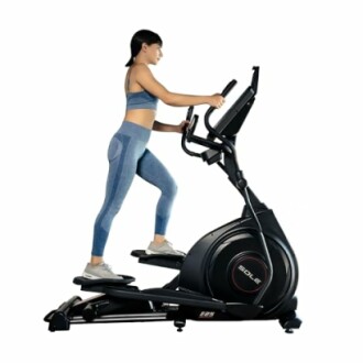 Woman exercising on an elliptical trainer